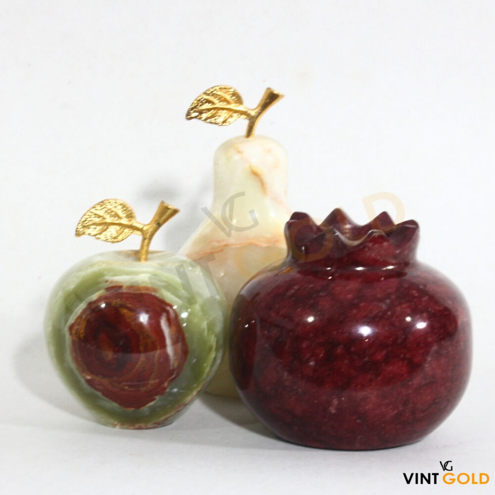 Decorative fruits pomegranate, apple and pear