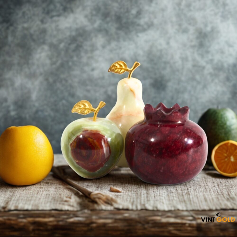 Decorative fruits pomegranate, apple and pear